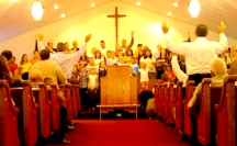 Raised hands of church